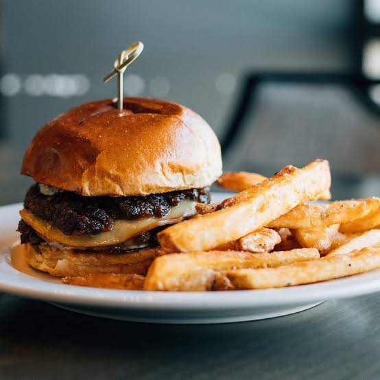 Gilmore's Pub signature dishes Beer Battered Hansen's Dairy Cheese Curds
Chicken Quesadilla
Whiskey Burger